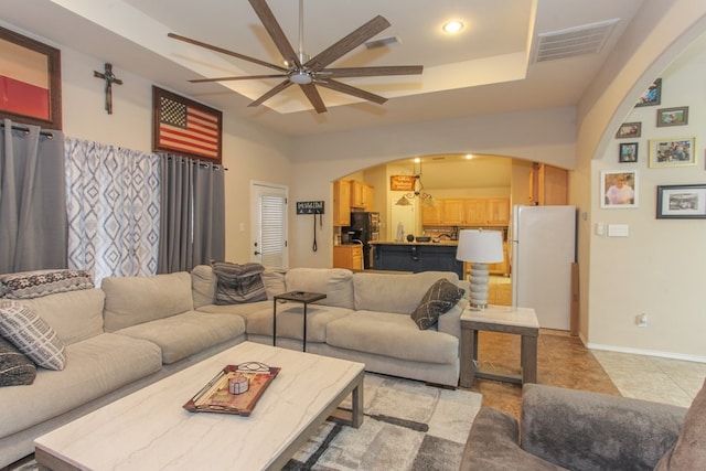 living room featuring ceiling fan