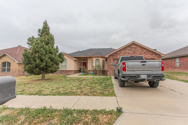 ranch-style house with a front lawn and a garage