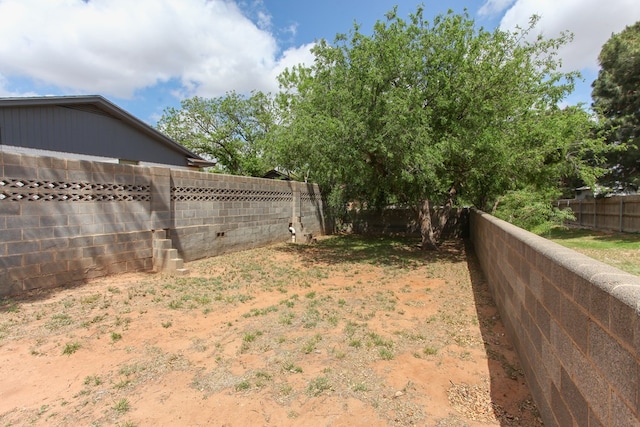 view of yard featuring a fenced backyard