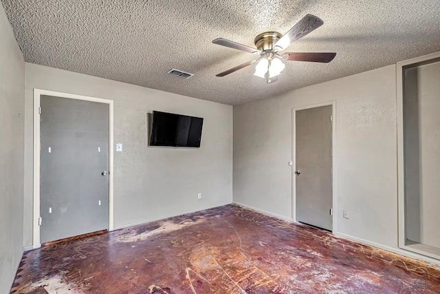 2821 Metz Dr, Midland, TX 79705 - spare room featuring a textured ceiling and ceiling fan
