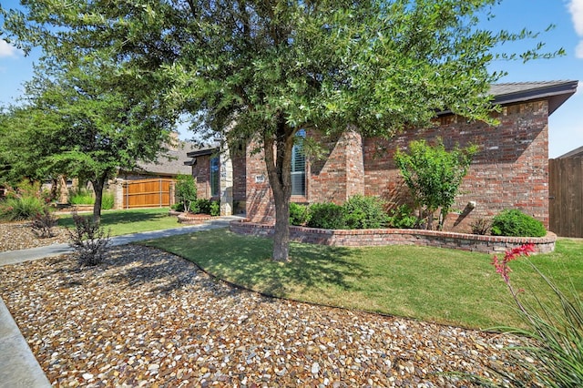 5514 Casa Grande Trl, Midland, TX 79707 - obstructed view of property with brick siding