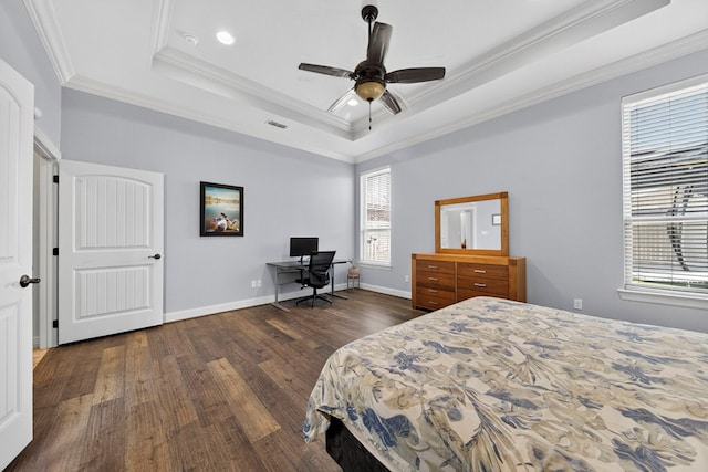 5514 Casa Grande Trl, Midland, TX 79707 - bedroom featuring dark wood-style floors, crown molding, a tray ceiling, a desk, and baseboards