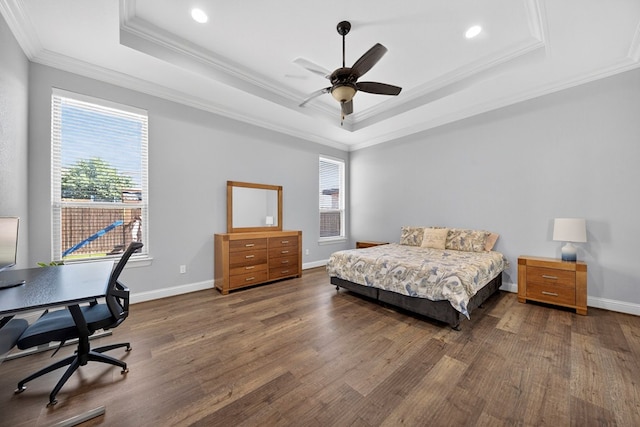 5514 Casa Grande Trl, Midland, TX 79707 - bedroom with a tray ceiling, crown molding, wood finished floors, recessed lighting, and a desk
