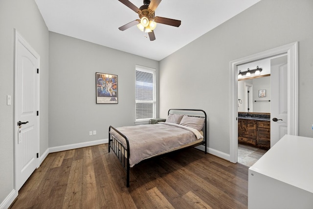 5514 Casa Grande Trl, Midland, TX 79707 - bedroom with wood finished floors, baseboards, ensuite bath, and ceiling fan