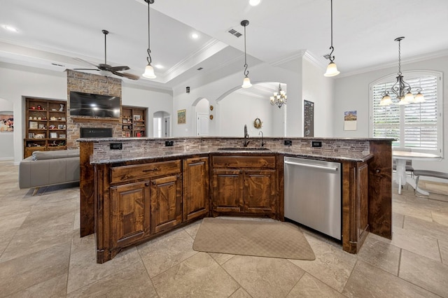 5514 Casa Grande Trl, Midland, TX 79707 - kitchen featuring stainless steel dishwasher, ornamental molding, a sink, arched walkways, and a ceiling fan