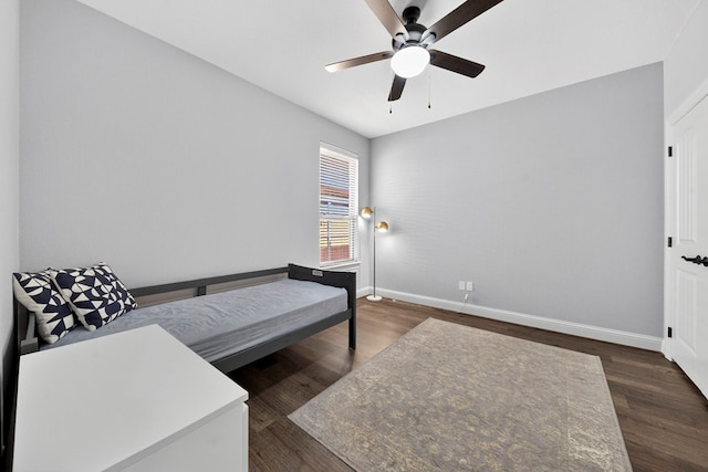 5514 Casa Grande Trl, Midland, TX 79707 - bedroom featuring baseboards, dark wood-style floors, and a ceiling fan