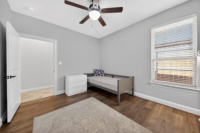 5514 Casa Grande Trl, Midland, TX 79707 - bedroom with wood finished floors, baseboards, and ceiling fan