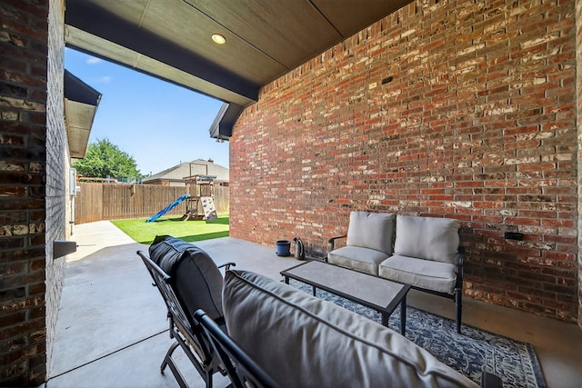 5514 Casa Grande Trl, Midland, TX 79707 - fenced backyard featuring outdoor lounge area, a playground, and a patio