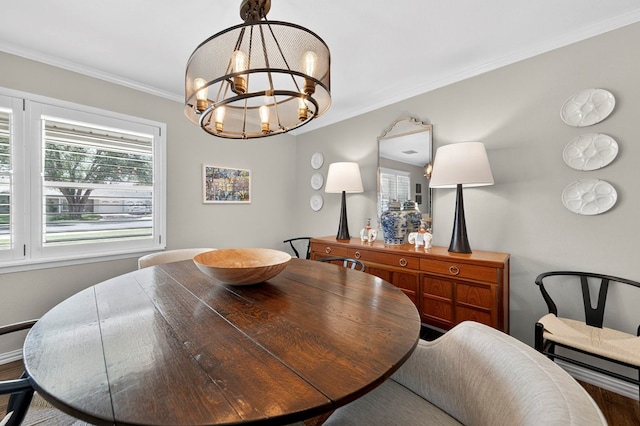 2802 Cimmaron Ave, Midland, TX 79705 - dining space featuring a chandelier and ornamental molding