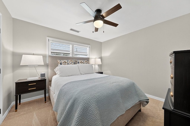 2802 Cimmaron Ave, Midland, TX 79705 - bedroom with light colored carpet and ceiling fan