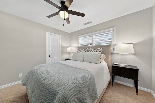 2802 Cimmaron Ave, Midland, TX 79705 - bedroom featuring light carpet and a ceiling fan