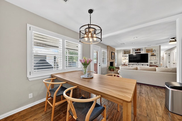 2802 Cimmaron Ave, Midland, TX 79705 - dining room with a chandelier and wood finished floors