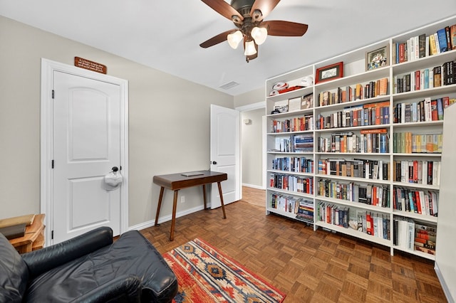 2802 Cimmaron Ave, Midland, TX 79705 - sitting room with ceiling fan and baseboards
