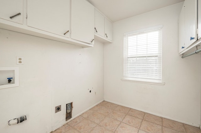 laundry area featuring cabinet space, hookup for a washing machine, baseboards, and hookup for an electric dryer