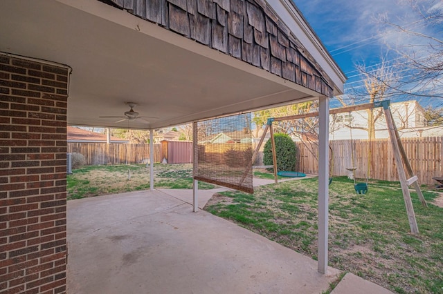 view of patio / terrace featuring a fenced backyard and a ceiling fan