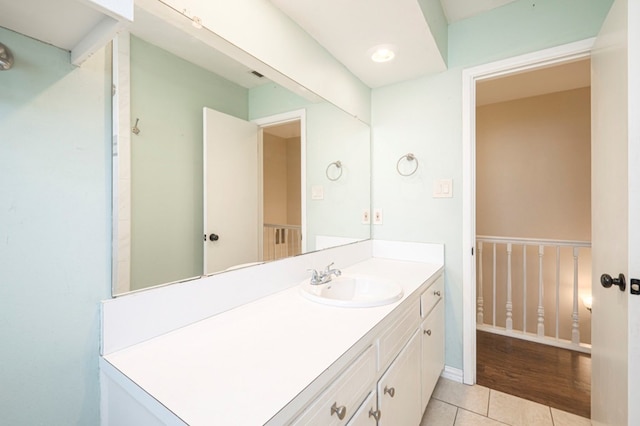 bathroom with vanity and tile patterned floors