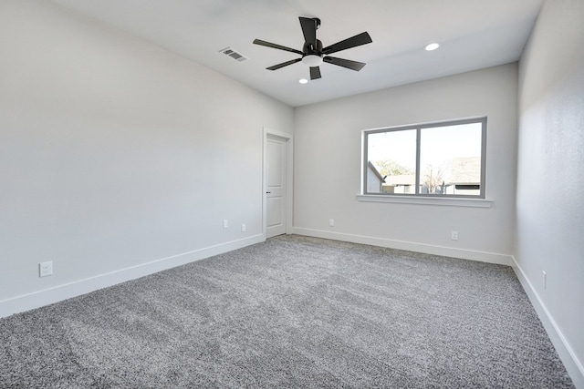 unfurnished room with carpet flooring and ceiling fan