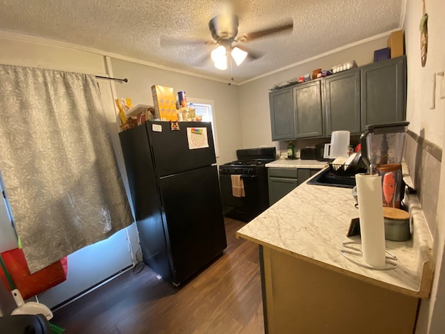 kitchen featuring a sink, light countertops, ceiling fan, dark wood-style floors, and black appliances