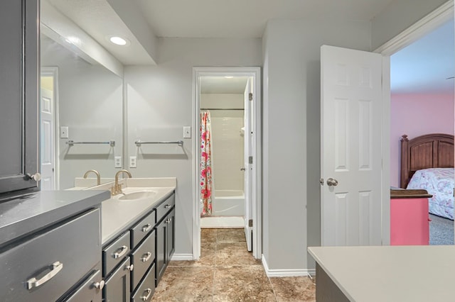 7005 Ridgeboro Ct, Midland, TX 79707 - full bath featuring vanity, baseboards, ensuite bathroom, shower / bath combo, and recessed lighting
