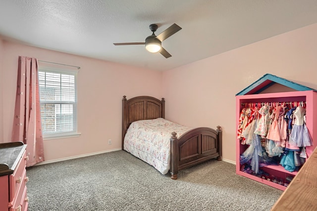 7005 Ridgeboro Ct, Midland, TX 79707 - bedroom featuring carpet floors, a ceiling fan, and baseboards
