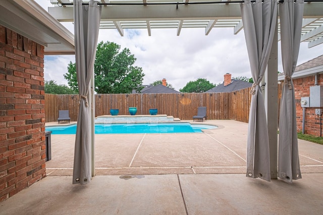 7005 Ridgeboro Ct, Midland, TX 79707 - view of swimming pool with a pergola, a fenced backyard, and a patio