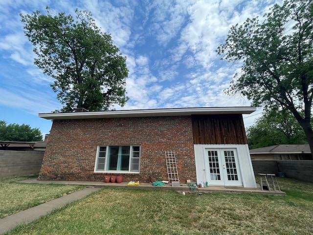 2804 33rd St, Snyder, TX 79549 - back of property with brick siding and french doors
