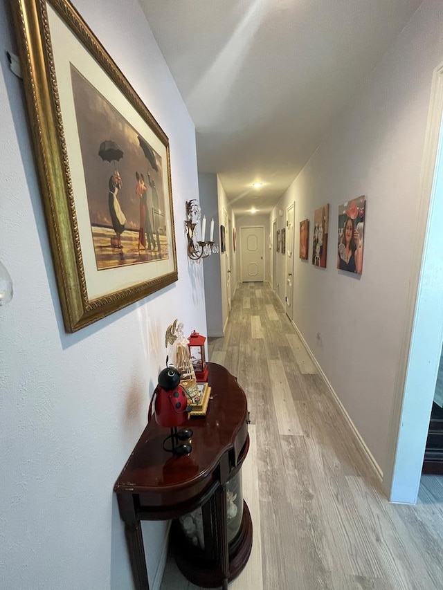 2804 33rd St, Snyder, TX 79549 - hall featuring light wood finished floors and baseboards