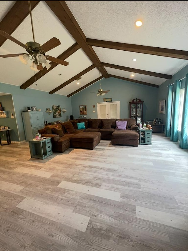2804 33rd St, Snyder, TX 79549 - living room featuring ceiling fan, light wood-style floors, recessed lighting, and a textured ceiling