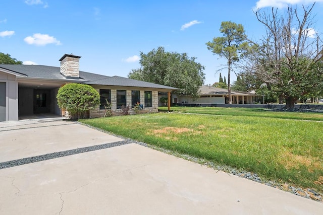 view of yard with a carport