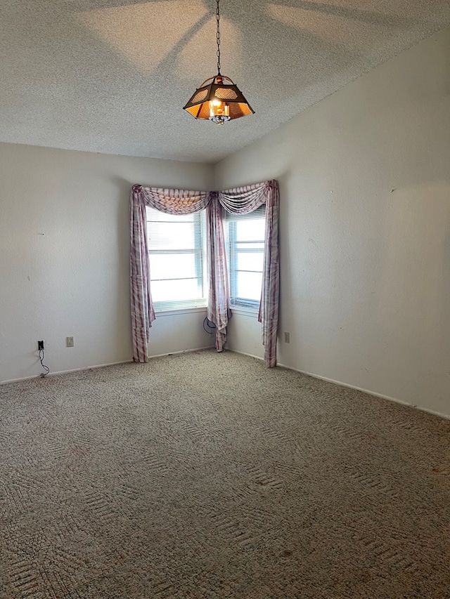 4400 Palmer Dr, Midland, TX 79705 - carpeted spare room with a textured ceiling