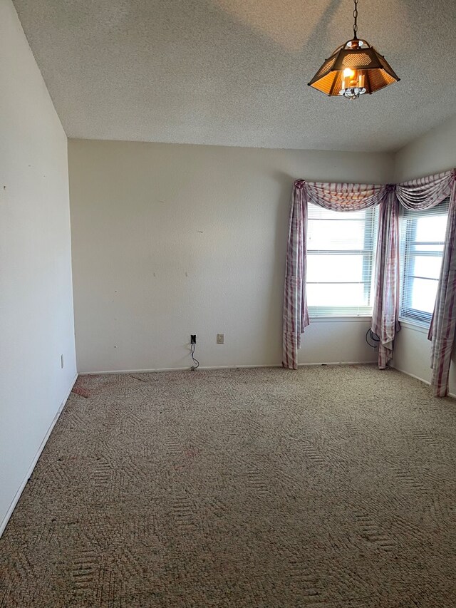 4400 Palmer Dr, Midland, TX 79705 - carpeted empty room with a textured ceiling