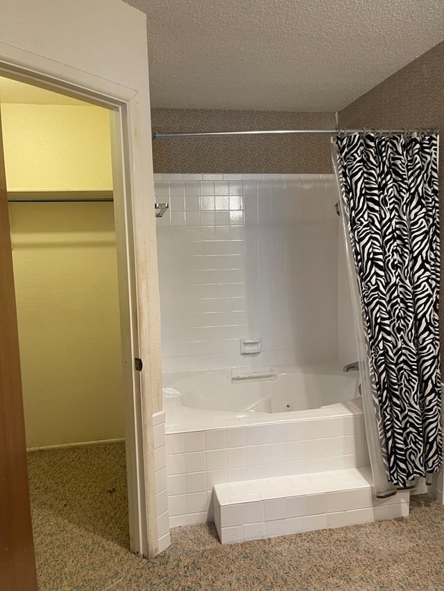 4400 Palmer Dr, Midland, TX 79705 - full bathroom with a combined bath / shower with jetted tub and a textured ceiling