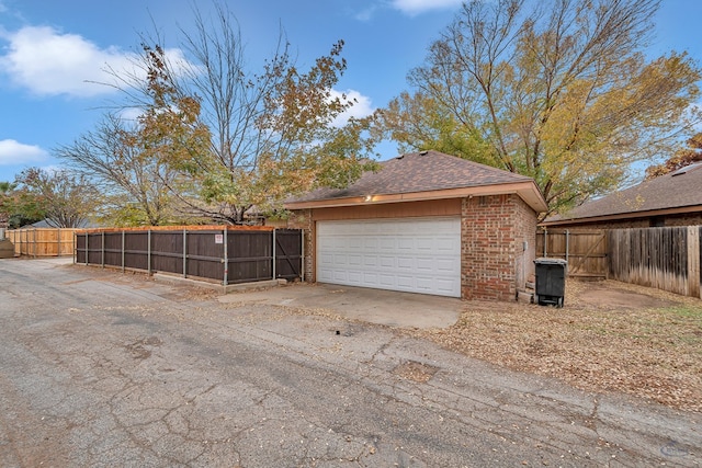 detached garage with fence