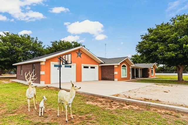 491 County Rd 202, Seminole, TX 79360 - view of front of home featuring a front lawn and driveway
