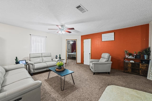 491 County Rd 202, Seminole, TX 79360 - living area with a ceiling fan, carpet flooring, and a textured ceiling