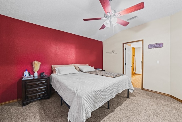 491 County Rd 202, Seminole, TX 79360 - carpeted bedroom with lofted ceiling, ceiling fan, and baseboards
