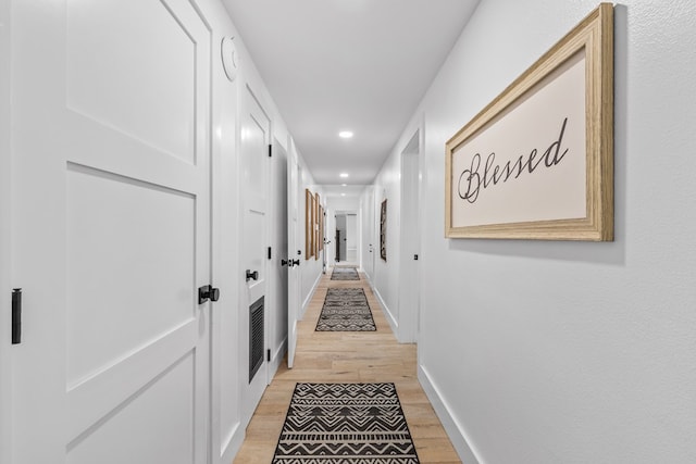 1611 W Tennessee Ave, Midland, TX 79701 - hallway with light wood-type flooring, recessed lighting, and baseboards
