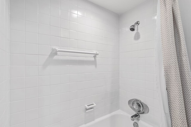 1611 W Tennessee Ave, Midland, TX 79701 - bathroom featuring shower / bath combo with shower curtain