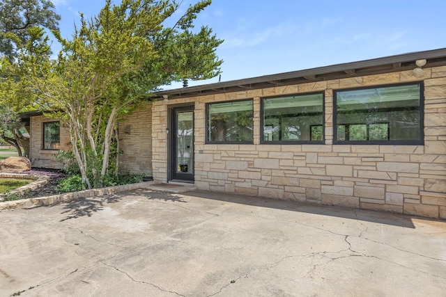 1611 W Tennessee Ave, Midland, TX 79701 - entrance to property featuring stone siding