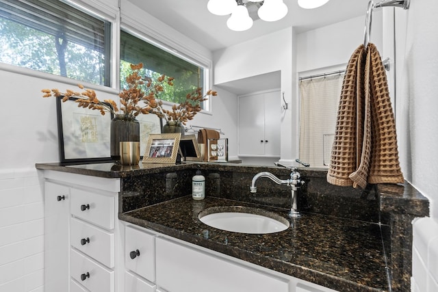 1611 W Tennessee Ave, Midland, TX 79701 - full bathroom with vanity