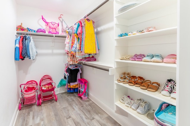 6004 Silent Rain, Midland, TX 79705 - walk in closet with wood finished floors