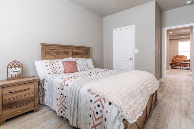 6004 Silent Rain, Midland, TX 79705 - bedroom featuring light wood-style floors