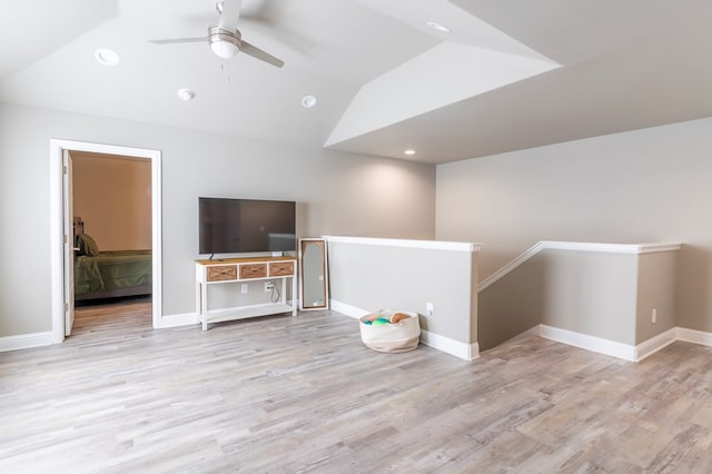 6004 Silent Rain, Midland, TX 79705 - unfurnished living room featuring vaulted ceiling, a ceiling fan, wood finished floors, and recessed lighting