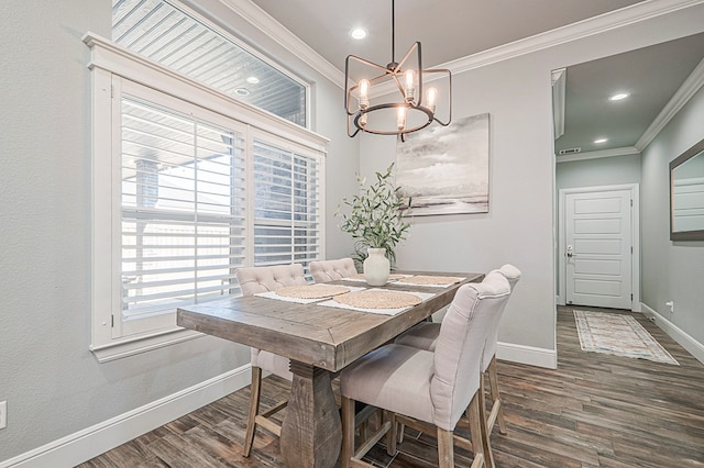 dining space featuring ornamental molding, a chandelier, dark wood finished floors, and baseboards