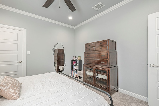 bedroom featuring light carpet, baseboards, visible vents, a ceiling fan, and ornamental molding