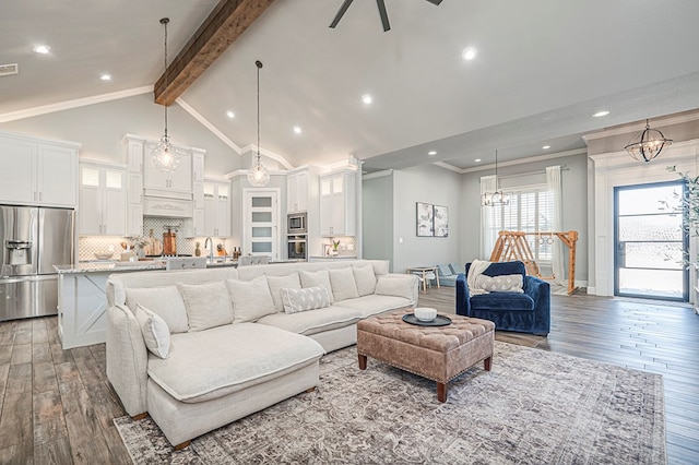 living area with crown molding, beamed ceiling, high vaulted ceiling, and wood finished floors