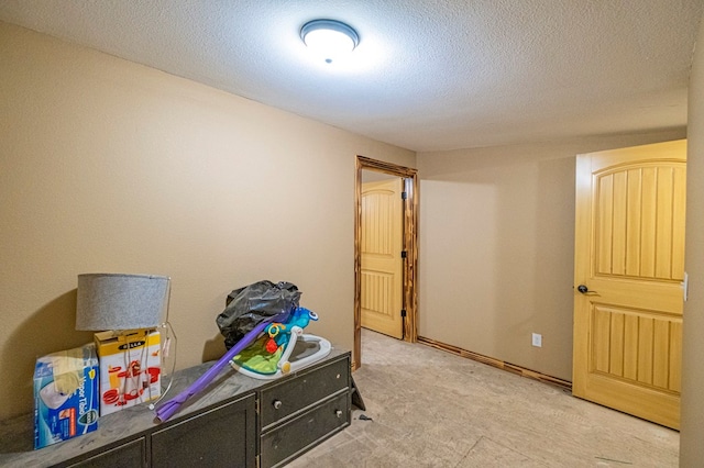 bedroom featuring a textured ceiling