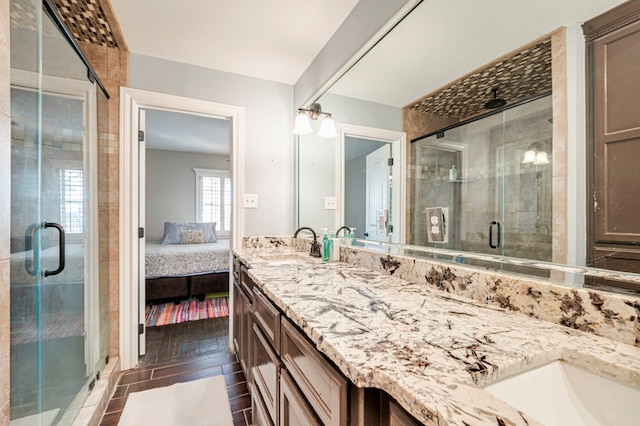 bathroom featuring hardwood / wood-style floors, vanity, and a shower with door