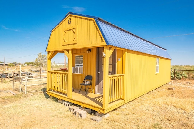 view of outbuilding with cooling unit