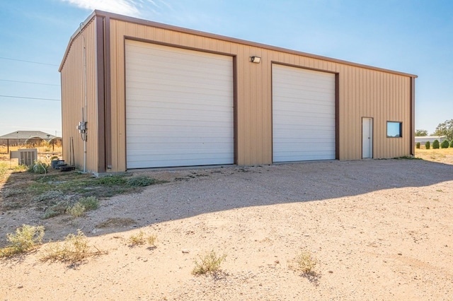 garage featuring central air condition unit